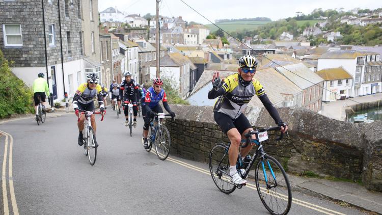 Classic cyclist in a village