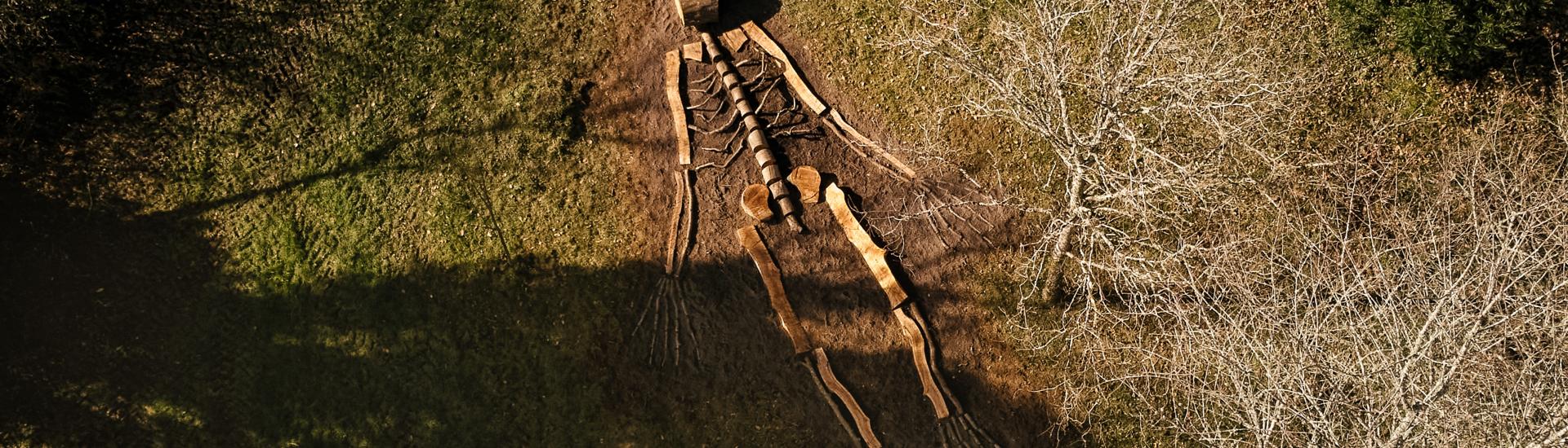 Aerial view of a giant stick skeleton sculpture