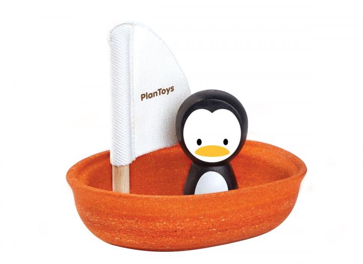 Plan Toy sailing boat with penguin