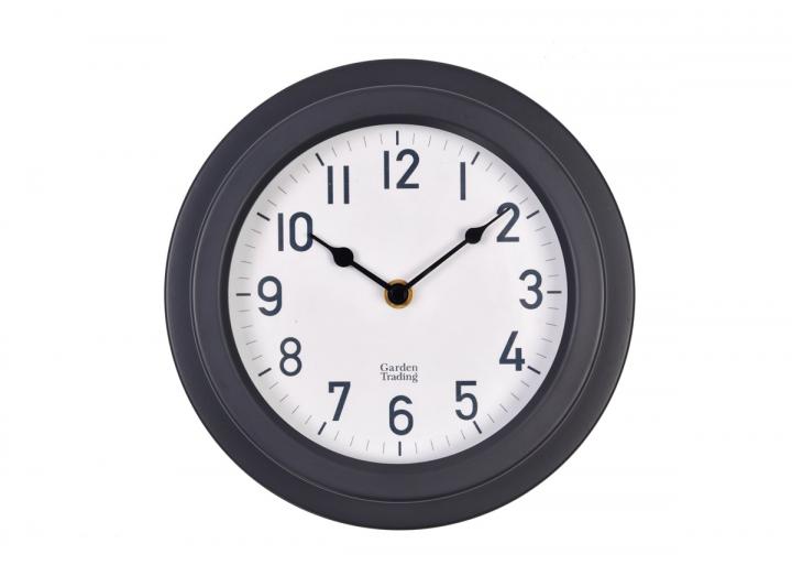 Tenby powder coated steel clock in carbon from Garden Trading