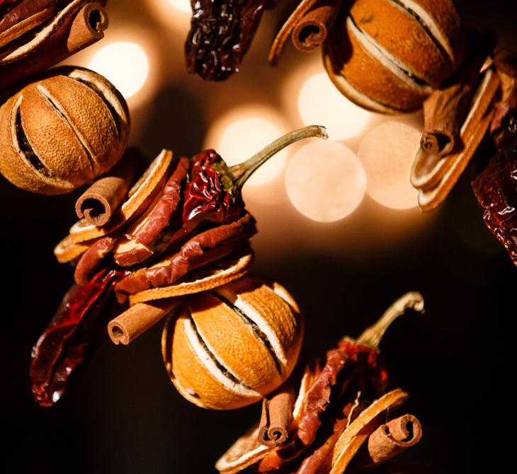Christmas garland made from oranges, cinnamon and dried chillies