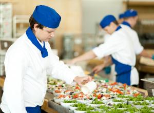 chefs preparing salad