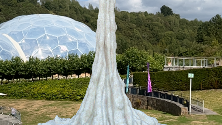 An AR ice sculpture in the outdoor gardens with the Biomes in the background