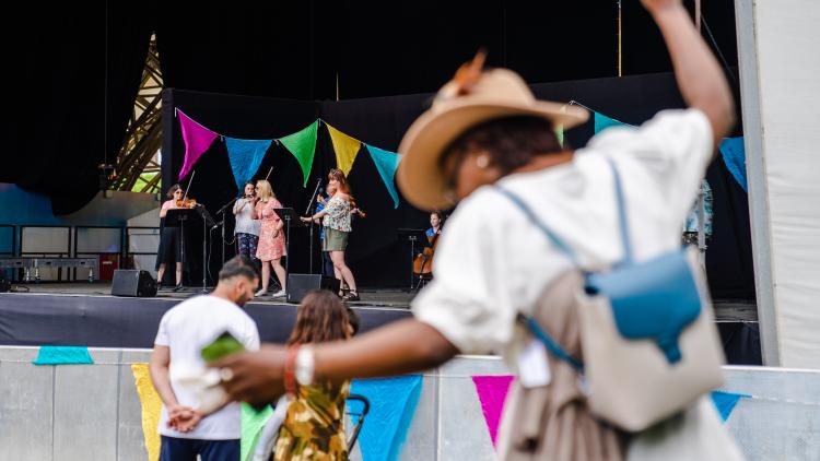 Woman dancing to Eden Orchestra