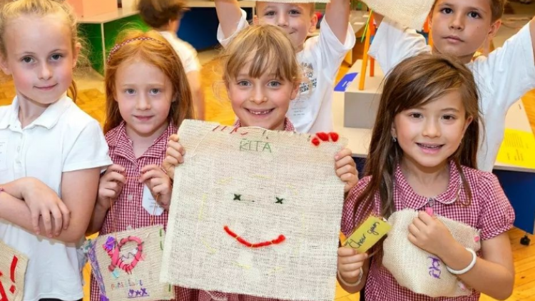 Crafts Council: Schoolchildren showing their submissions for a previous Craft School challenge
