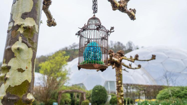 Dragon egg hanging in a cage at Eden Project