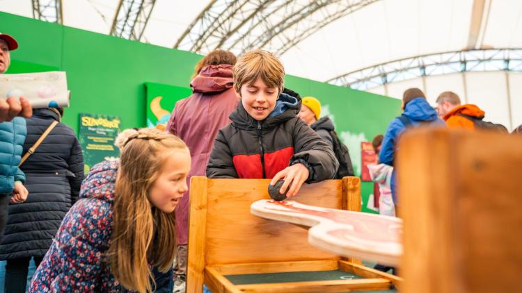 Children playing dragon themed games