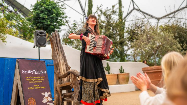 Storyteller telling stories with children at the Eden Project