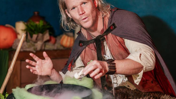 Man with caldron and mushrooms 