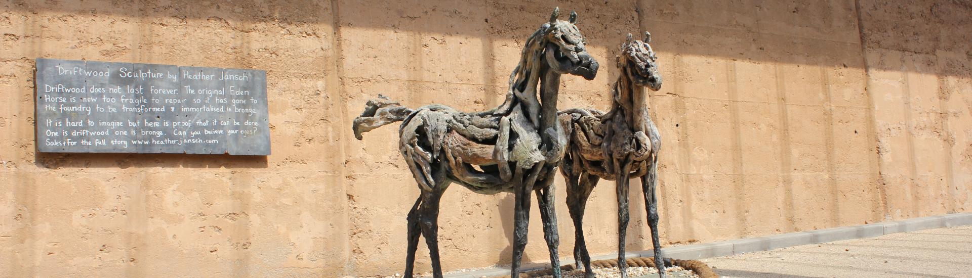 The two driftwood horses outside the main entrance 