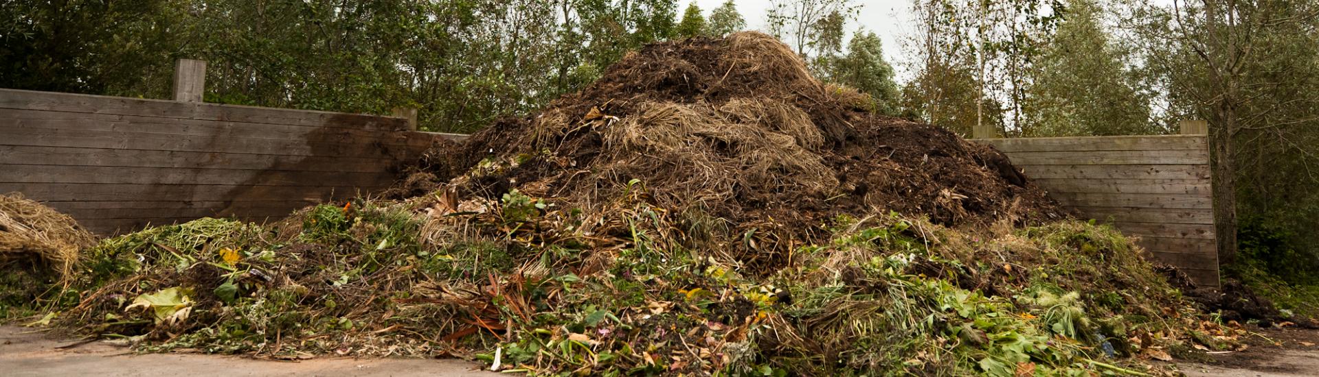 A landscape view of a big compost heap 