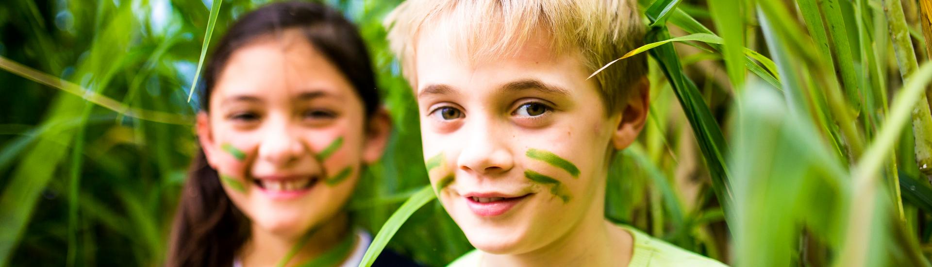 Pupils amidst undergrowth at Eden Project