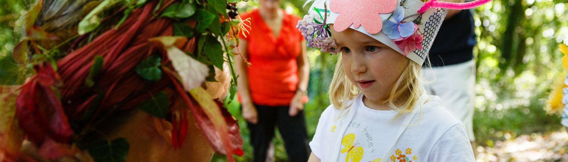 Little girl in nature with grandparents