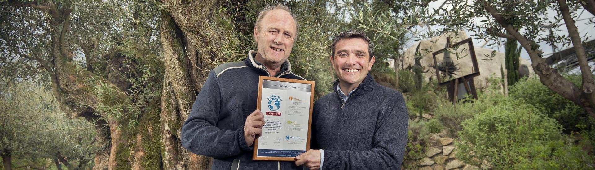 Co-founder of Eden Sir Tim Smit with Steve Malkin CEO of Planet First holding a certificate 