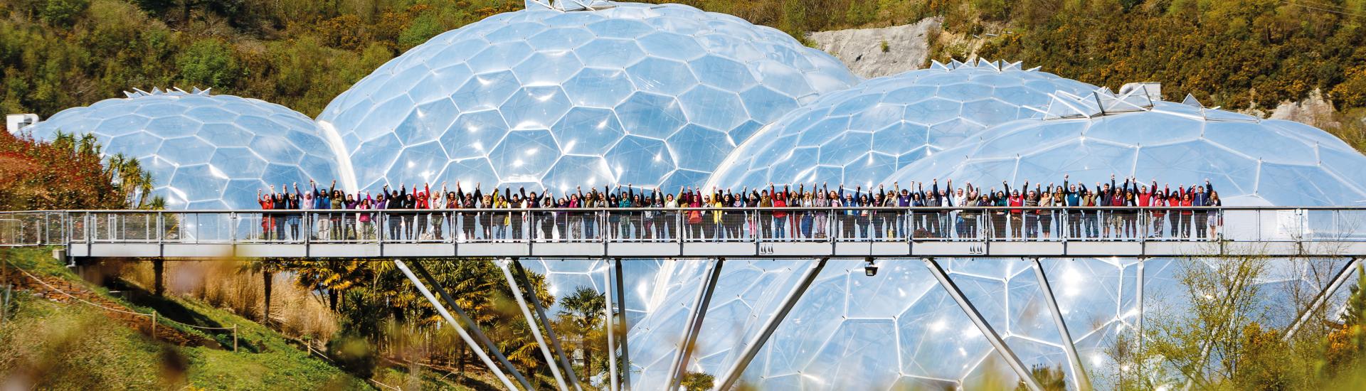 eden-project-people-waving-on-bridge