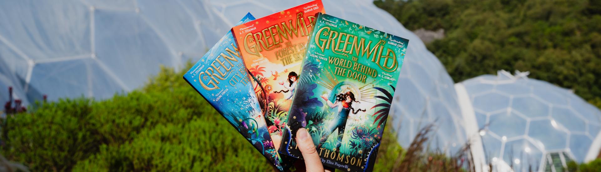 Greenwild Books held in front of Biomes